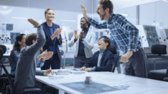 Team of engineers and specialists talking in a meeting