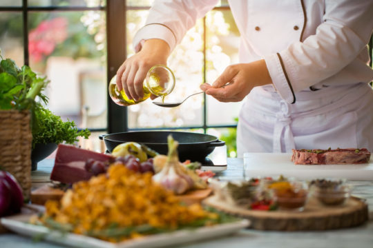 Jug,Pours,Liquid,Into,Spoon.,Raw,Meat,With,Spices.,High