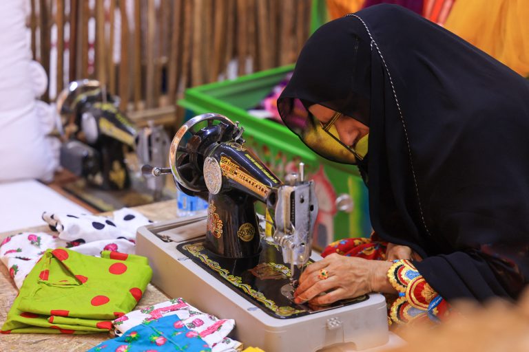 Arab woman does embroidery