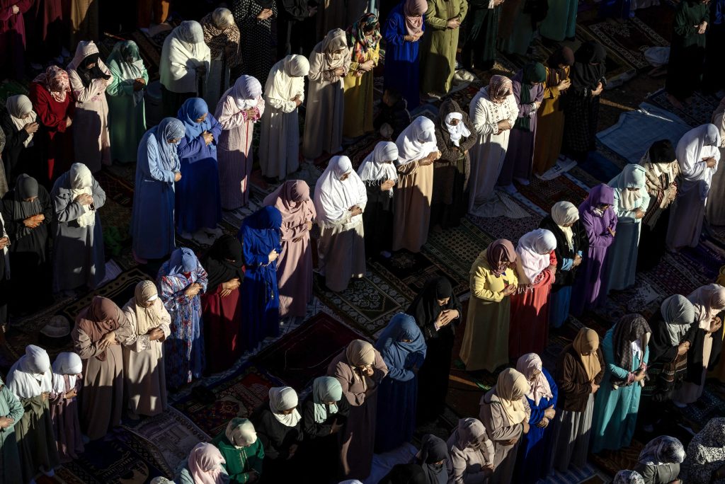 MOROCCO - Moroccan Muslim women perform prayers for Eid Al-Fitr which marks the end of Islam's holy fasting month of Ramadan in the city of Sale.