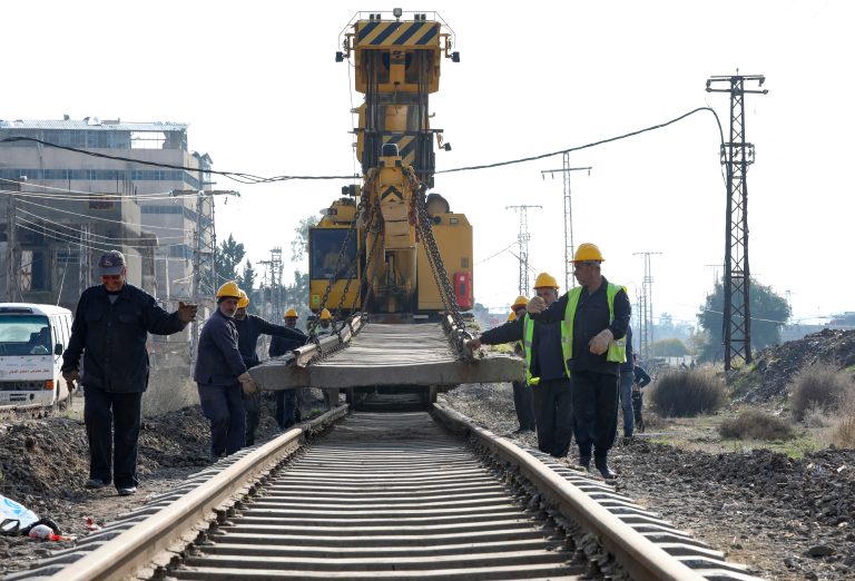 Workers repair rails near Damascus: Syria launches tender to purchase new equipment