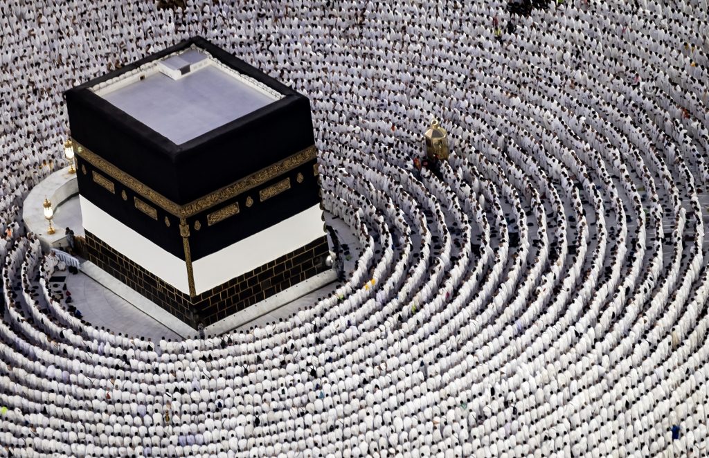 Muslim worshippers pray around the Kaaba, Islam's holiest shrine, at the Grand Mosque in Saudi Arabia's holy city of Mecca on June 13, 2024, ahead of the annual Hajj pilgrimage. - After travelling from all parts of the globe to Islams holiest city, the pilgrims will first perform the tawaf  walking seven times around the Kaaba, the giant black cube that Muslims worldwide pray towards every day. (Photo by FADEL SENNA / AFP)
