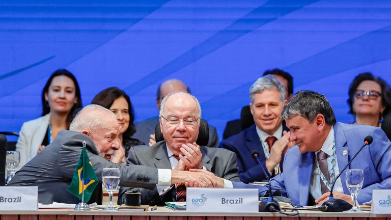 Global Alliance Against Hunger approved at G20 With foreign minister Mauro Vieira in the center, Lula (L) greets minister Wellington Dias (R) when speaking of the alliance against hunger during the G20