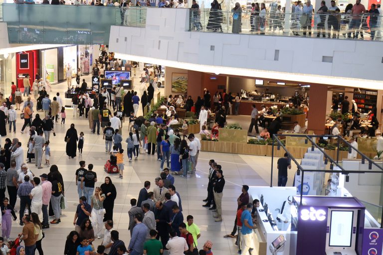People walk at The Avenues, Kuwait's biggest shopping mall, on June 16, 2023 in Kuwait City. (Photo by YASSER AL-ZAYYAT / AFP)