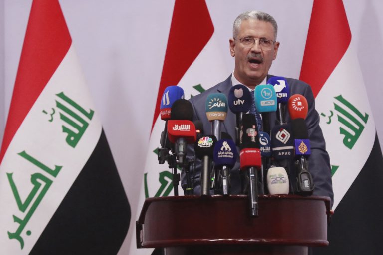 Iraq's Minister of Oil Hayan Abdul Ghani al-Sawad during the signing ceremony of the Gas Growth Integrated Project (GGIP) agreement with French energy firm TotalEnergies during an official ceremony in Baghdad on July 10, 2023. The GGIP is a 10 billion USD plan by a consortium of Iraq's Basra Oil Company, TotalEnergies, and state-owned QatarEnergy, aimed at more efficiently using Iraqi gas resources and improving the country's rundown electricity grid. (Photo by Ahmad AL-RUBAYE / AFP)