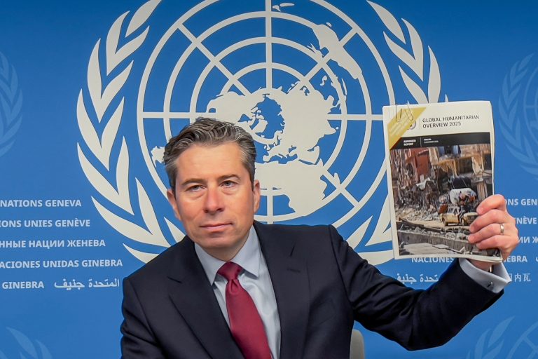 UN calls for $47 billion in aid for 2025 Humanitarian Affairs and Emergency Relief Coordinator (OCHA) Under-Secretary-General Tom Fletcher holds the Global Humanitarian Overwiew 2025 report during a press conference in Geneva on December 3, 2024. (Photo by Elodie LE MAOU / AFP)