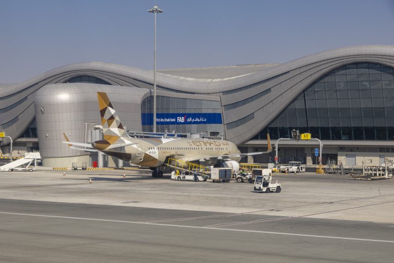 Airbus A320 airplane of Etihad Airways with the registration tail number A6-EJA spotted at Abu Dhabi International Airport AUH Zayed International Airport at the Capital of the United Arab Emirates in front of the new Terminal A. Etihad Airways is one of the two flag carrier airlines of the UAE with a fleet of 85 Airbus and Boeing passenger aircraft.Abu Dhabi, UAE on December 2023 (Photo by Nicolas Economou/NurPhoto) (Photo by Nicolas Economou / NurPhoto / NurPhoto via AFP)