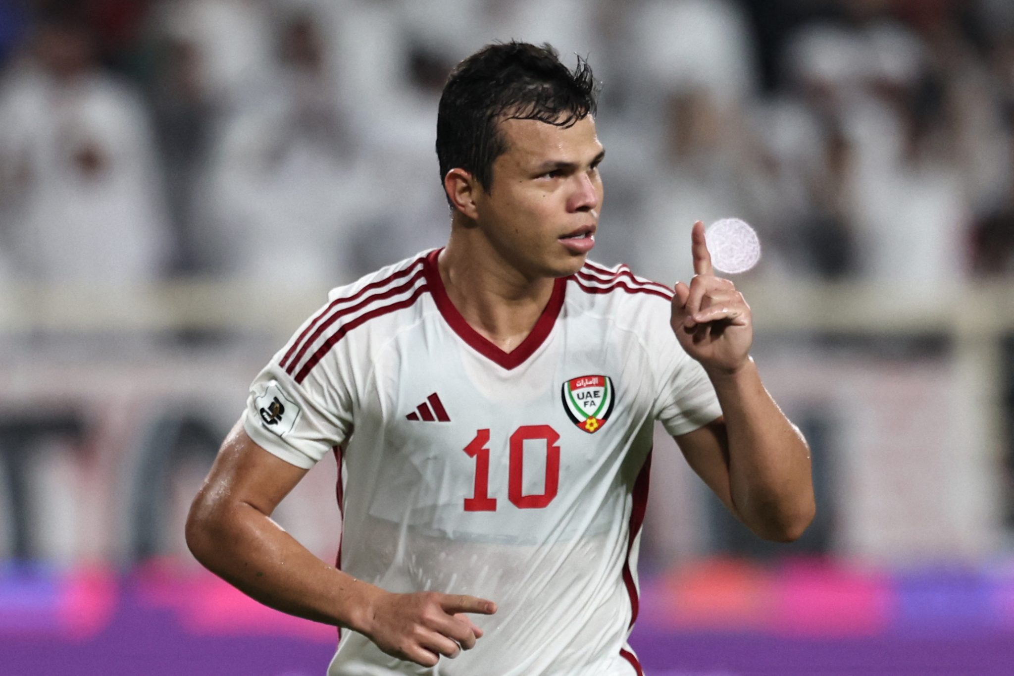 UAE's forward #10 Fabio de Lima celebrates scoring his team's second goal during the FIFA World Cup 2026 Asia zone qualifiers group A football match between UAE and Qatar at the Al-Nahyan Stadium in Abu Dhabi on November 19, 2024. (Photo by FADEL SENNA / AFP)