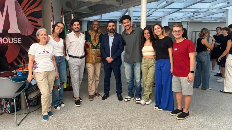 Latif (C) alongside representatives of other international institutions and students