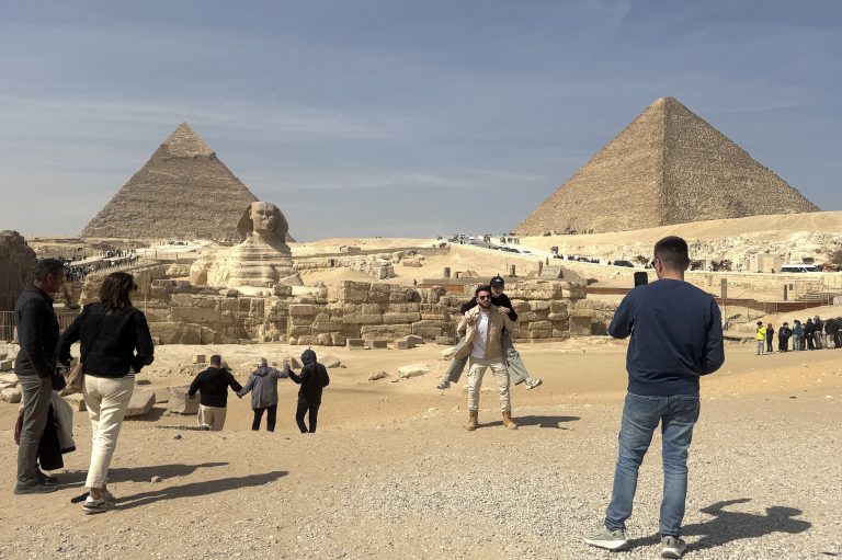 CAIRO, EGYPT - FEBRUARY 25: People visit Great Pyramid of Giza, one of the seven wonders of the world, in Cairo, Egypt on February 25, 2025. The pyramids of Khufu, Khafre, and Menkaure, built 4,500 years ago as tombs for the pharaohs, remain a fascinating site for historians and scientists. Among them, only the Great Pyramid of Khufu has endured, continuing to draw interest from tourists worldwide. Yunus Hocaoglu / Anadolu (Photo by Yunus Hocaoglu / ANADOLU / Anadolu via AFP)
