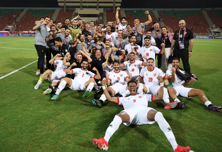 The team celebrates after securing a spot in the tournament taking place in the USA, Canada, and Mexico