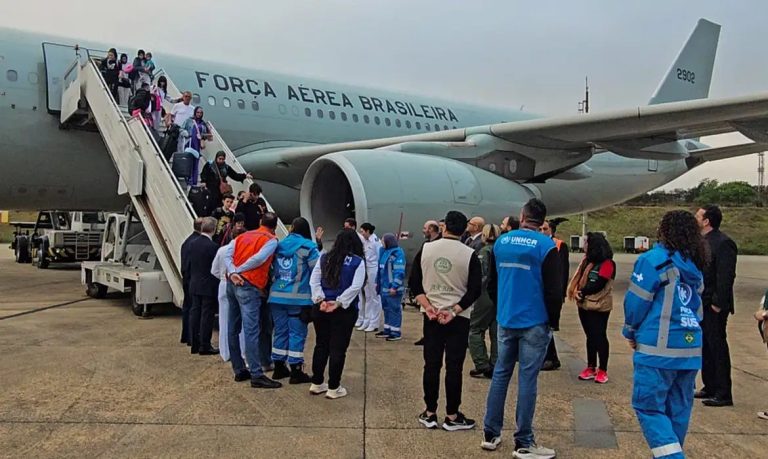 A homecoming plan for Brazilian repatriates Brazilian citizens alighting a Brazilian Air Force plane
