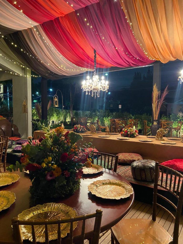 The décor evokes Arab-inspired settings