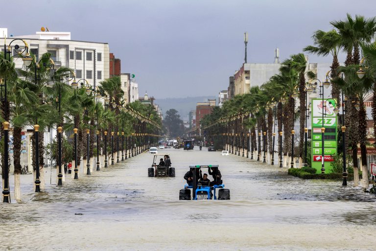 Brazil-Arab Gallery #47 Tractors move along an inundated main street in Morocco's northwestern city of Ksar el-Kebir on January 29, 2026, as several neighbourhoods flooded in the city due to a rise in the water level of the Loukkos river following recent heavy rainfall. (Photo by Abdel Majid BZIOUAT / AFP)