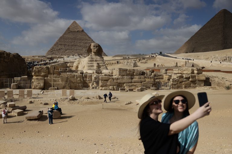 Arabs spotlight sustainability on Tourism Day A view of the pyramid of Khafre and the Great Sphinx as people take a selfie in Giza, Egypt on January 14, 2026. (Photo by Jakub Porzycki/NurPhoto) (Photo by Jakub Porzycki / NurPhoto via AFP)