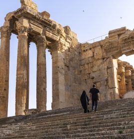 LEBANON - MUSLIM TOURISTS IN THE ANTIQUE RUINS AT THE ARCHEOLOGICAL SITE - BAALBEK