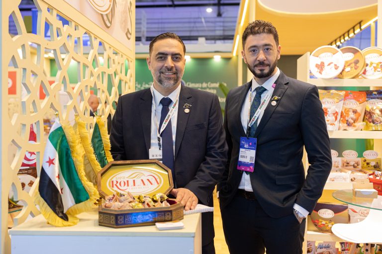 Jabri (L) and Al-Rifai (R) showcase Rollana chocolates at the APAS Show booth