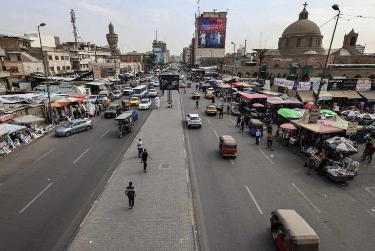 IMF revises economic outlook for the Middle East Commuters drive through Baghdad's Shorja market on October 13, 2026. The International Monetary Fund (IMF) has sharply cut growth forecasts for the Middle East and Central Asia in 2026, as the ongoing war has sent economies into a tailspin. (Photo by AHMAD AL-RUBAYE / AFP)