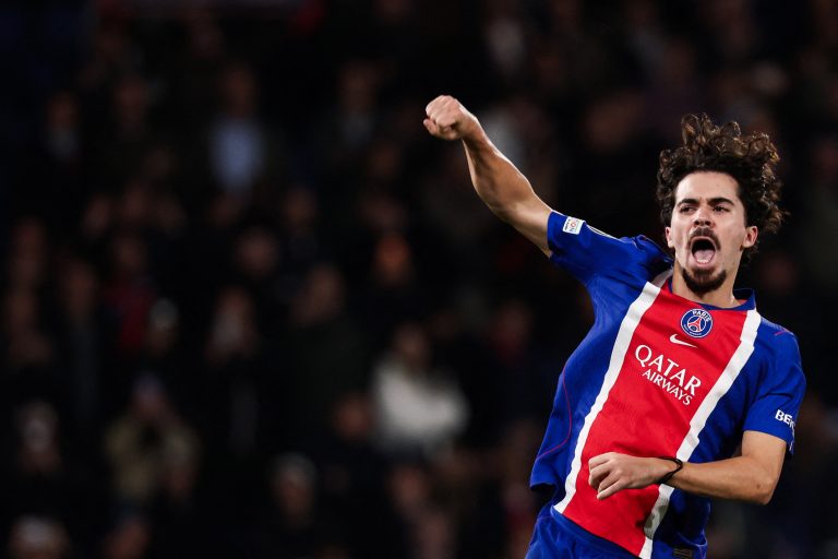PSG's Portuguese midfielder #17 Vitinha celebrates after scoring his team third goal during the UEFA Champions League first round day 3 football match between Paris Saint-Germain (PSG) and FC Barcelona at the Parc de Princes stadium in Paris on October 20, 2026. (Photo by FRANCK FIFE / AFP)